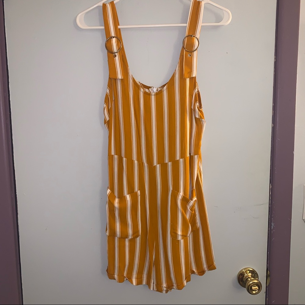 Small, mustard yellow and white romper